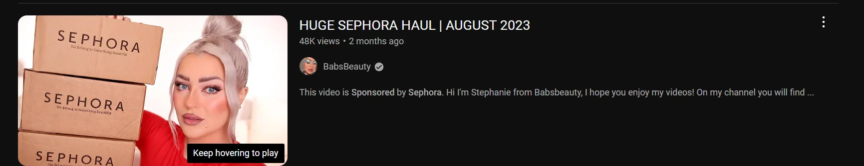 A youtube influencer showing sephora sponsored products